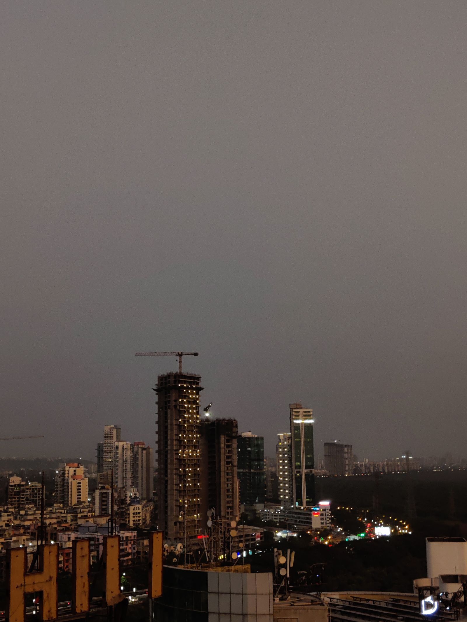 High-rise towers across a city skyline at dusk